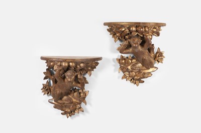 Lot 287 - A pair of carved giltwood wall brackets