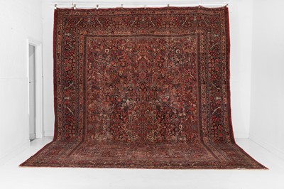 Lot 316 - A large Mashad wool carpet