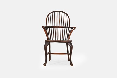 Lot 676 - A George III yew and elm Windsor chair