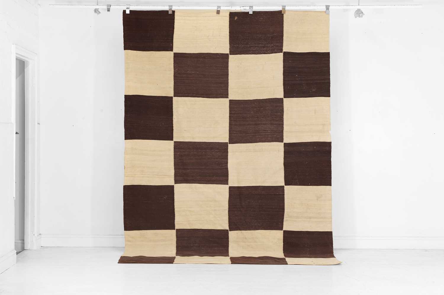Lot 4 - A flat-weave wool carpet
