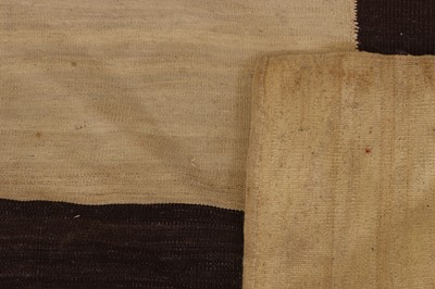 Lot 4 - A flat-weave wool carpet