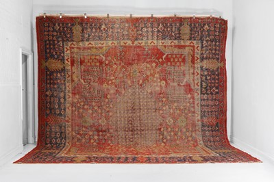 Lot 90 - An Oushak wool carpet
