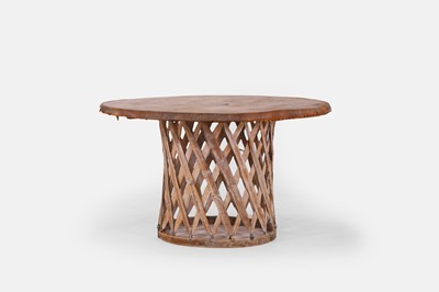 Lot 5 - A leather and wooden centre table