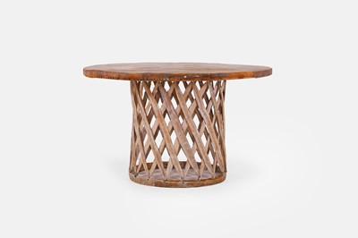 Lot 5 - A leather and wooden centre table