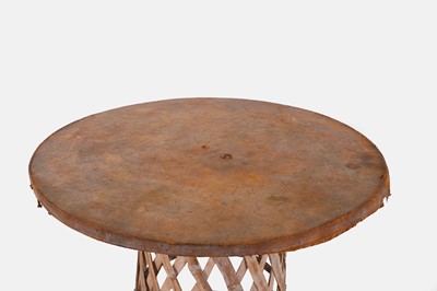 Lot 5 - A leather and wooden centre table