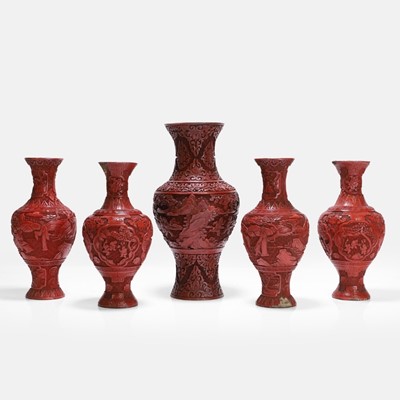 Lot 64 - A group of red lacquer vases