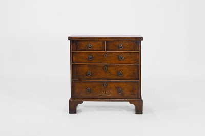 Lot 660 - A George I-style walnut and inlaid bachelor’s chest
