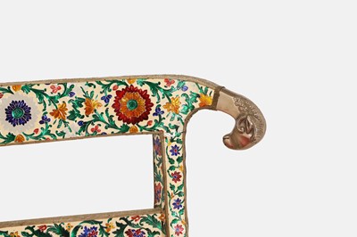 Lot 588 - A silver-metal and enamel-clad settee in the Regency style