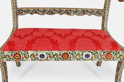 Lot 588 - A silver-metal and enamel-clad settee in the Regency style