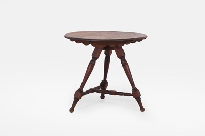 Lot 105 - A provincial pine tripod table