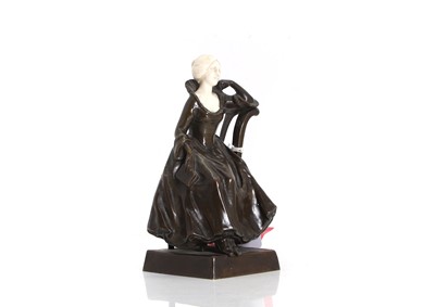 Lot 256 - An art deco bronze and ivory figure