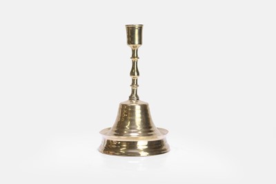 Lot 549 - A brass candlestick