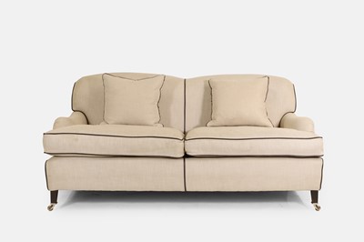 Lot 313 - An upholstered two-seater sofa in the Howard & Sons style