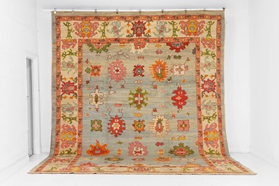 Lot 145 - An Oushak wool carpet