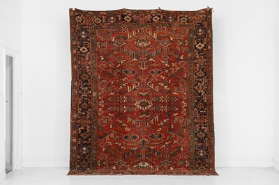 Lot 662 - A Heriz wool carpet
