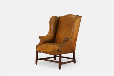 Lot 558 - A George III wingback armchair