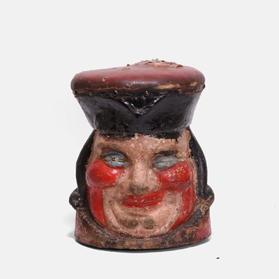 Lot 162 - An unusual folk art mask-head stool