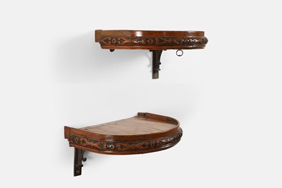 Lot 274 - A pair of walnut and olivewood parquetry wall brackets