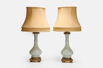 Lot 277 - A pair of celadon vase lamps
