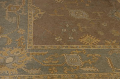 Lot 64 - An Oushak wool carpet