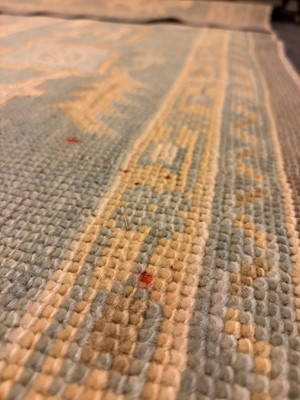 Lot 64 - An Oushak wool carpet