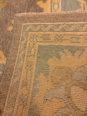 Lot 64 - An Oushak wool carpet