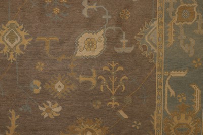Lot 64 - An Oushak wool carpet