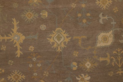 Lot 64 - An Oushak wool carpet