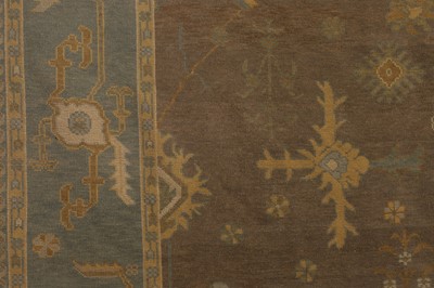 Lot 64 - An Oushak wool carpet