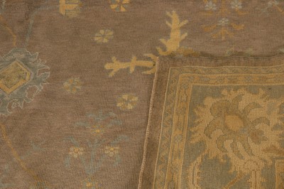 Lot 64 - An Oushak wool carpet