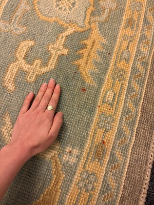 Lot 64 - An Oushak wool carpet