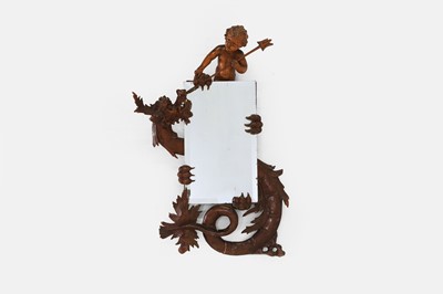 Lot 114 - A carved walnut mirror in the manner of Gabriel Viardot