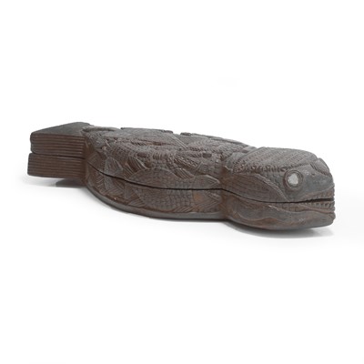 Lot 134 - A dugout and chip-carved wooden box and cover