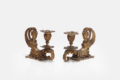 Lot 251 - A pair of ormolu candlesticks