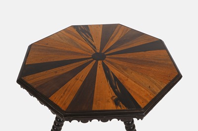 Lot 636 - An ebony and specimen wood tripod table