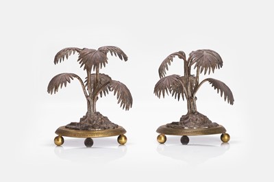 Lot 631 - A pair of brass palm trees