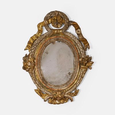 Lot 516 - A baroque-style carved silvered and giltwood mirror