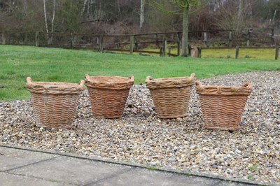 Lot 687 - A set of four terracotta garden pots
