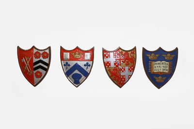 Lot 675 - Four painted plaster armorial shields