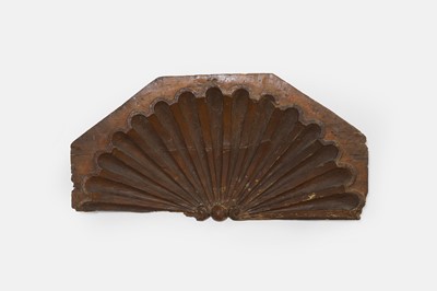 Lot 256 - A carved and painted shell crest