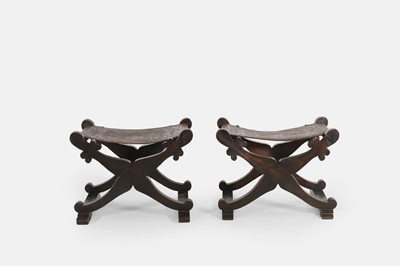 Lot 555 - A pair of Savonarola stools