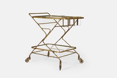 Lot 328 - A brass and glass drinks trolley