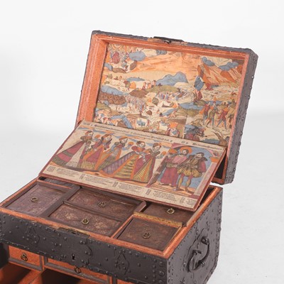 Lot 174 - An unusual highly decorated iron-bound strongbox