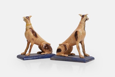 Lot 96 - A pair of faience greyhound figures