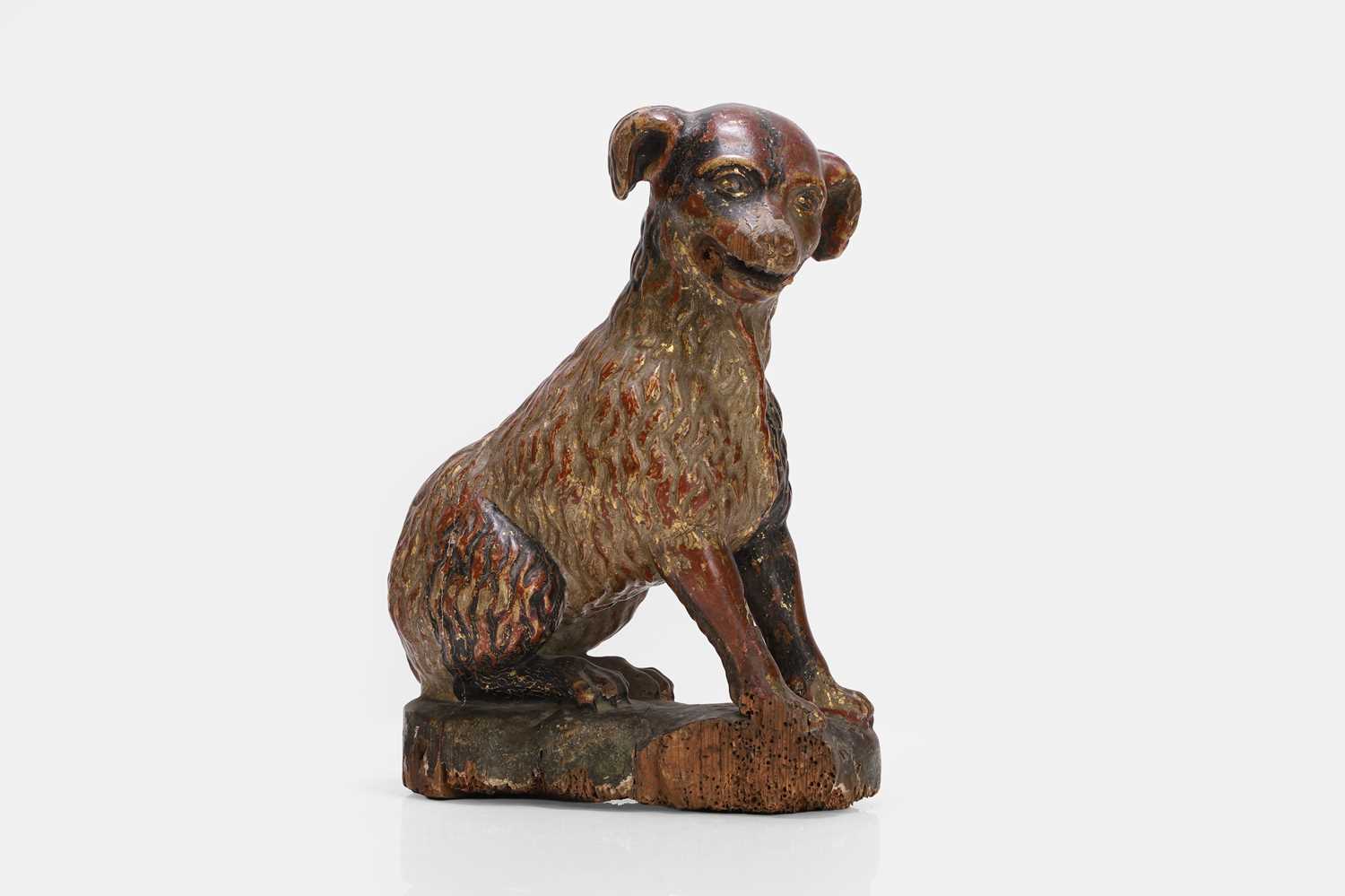 Lot 97 - A carved wooden 'St Roch' dog figure