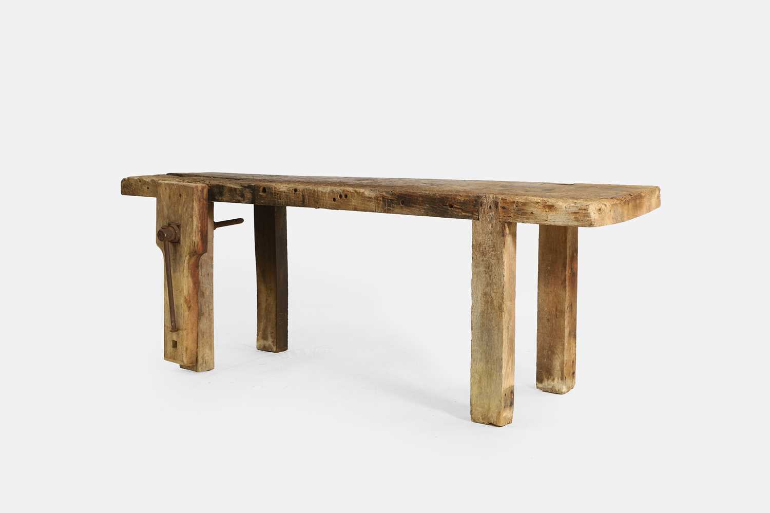 Lot 104 - An elm and oak carpentry bench