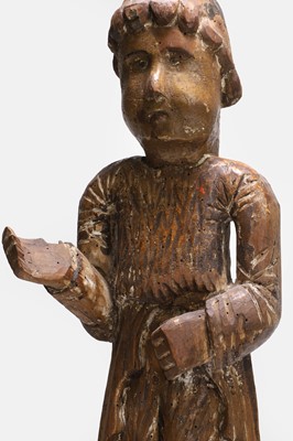 Lot 99 - A carved wooden figure of a monk