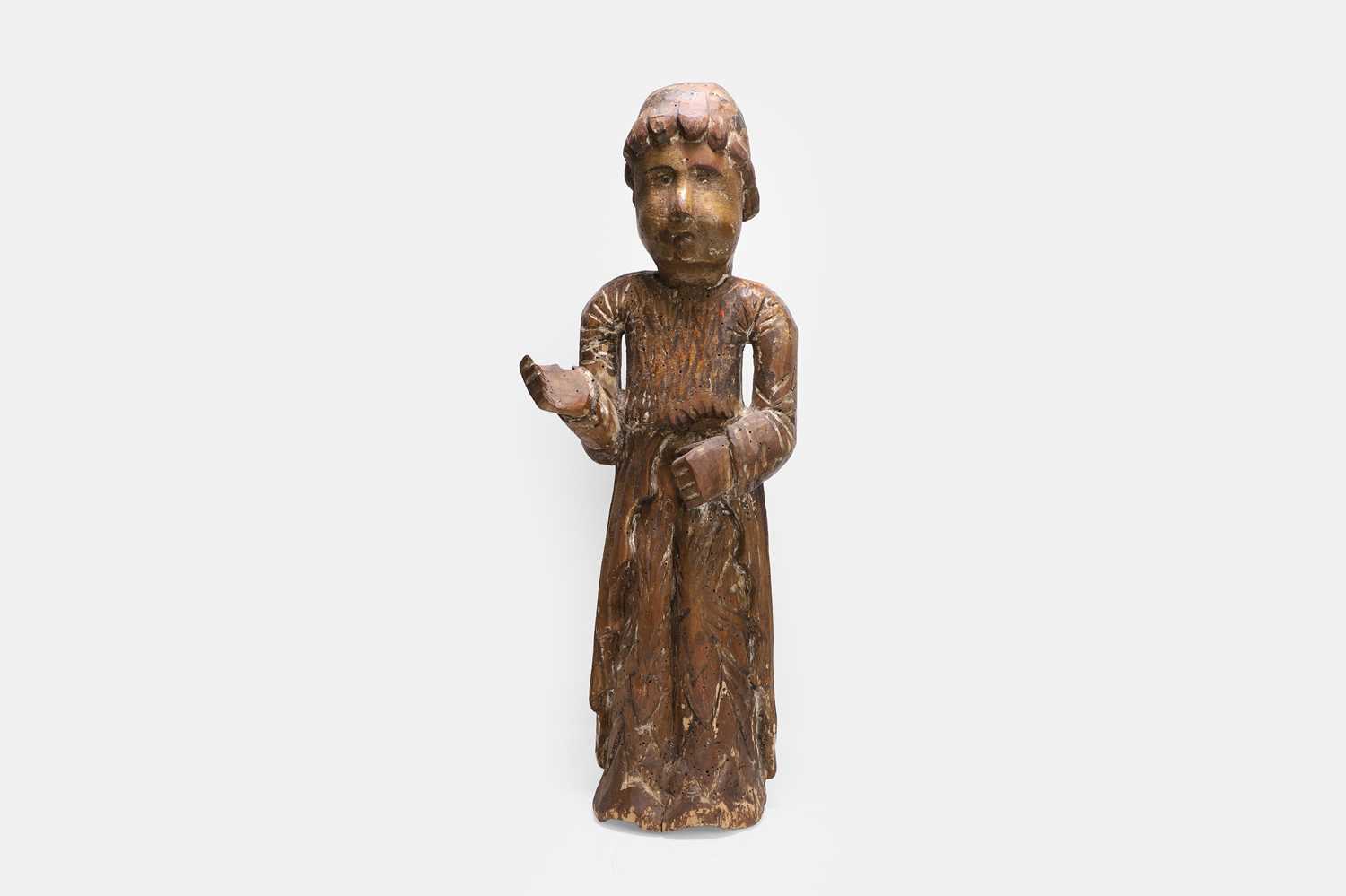 Lot 99 - A carved wooden figure of a monk