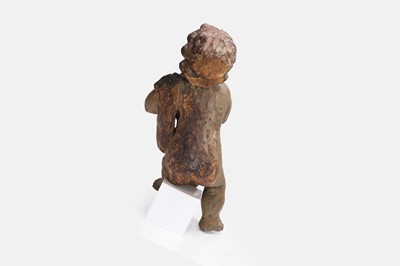 Lot 90 - A carved wooden putto
