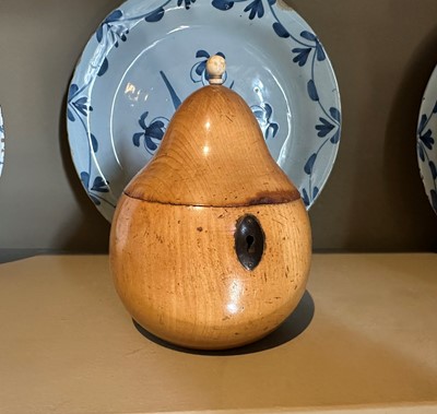 Lot 116 - A treen fruitwood tea caddy